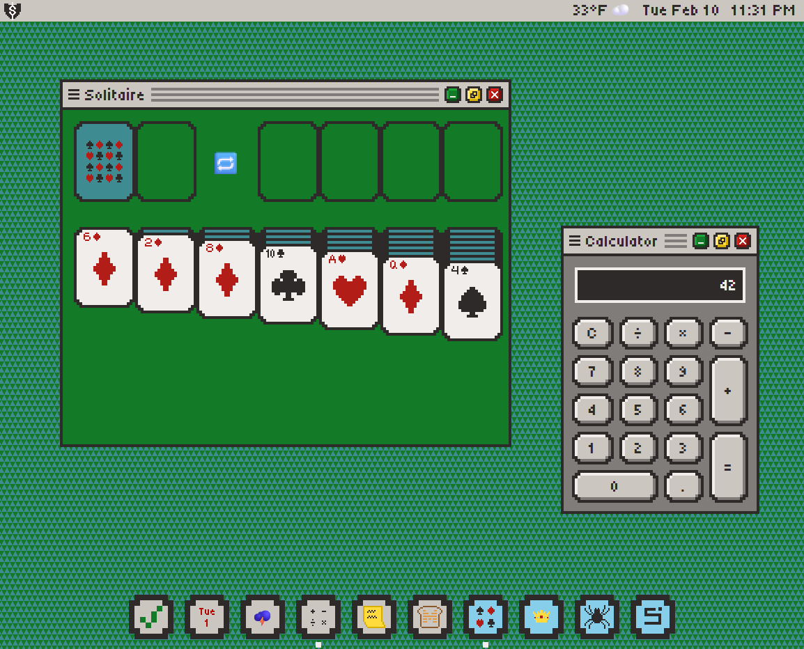 Screenshot of Sigfreed app showing Solitaire and Calculator open